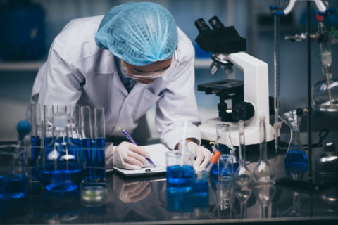 Health care researchers working in life science laboratory